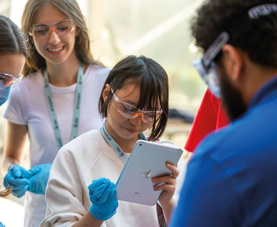 summer-school-medic-students-looking-at-ipad