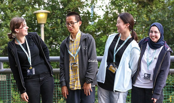 SBC-Cambridge-college-students-laughing-outside-in-the-summer