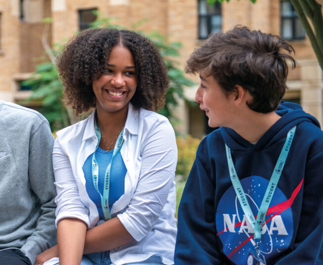 Smiling female student with two other students at Oxford College 澳洲五号码结果 Summer Boarding Courses