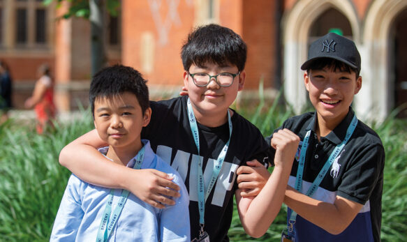 Three-male-students-outside-of-SBC-at-Eton-College-Summer-School